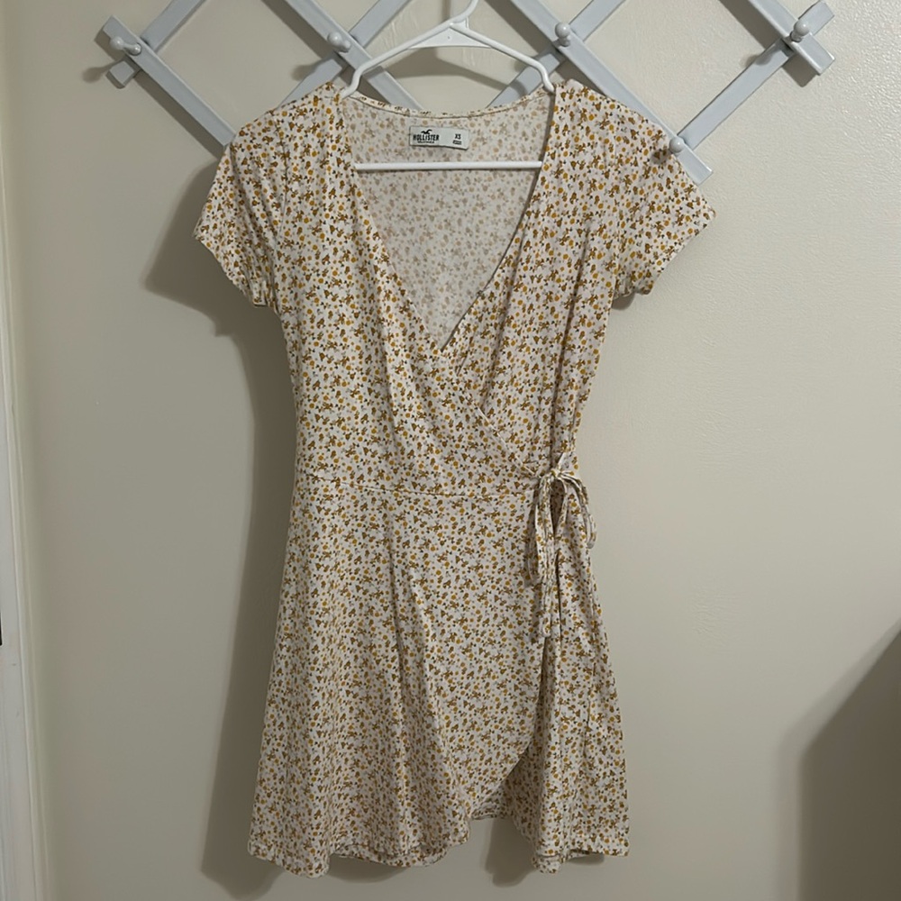 White and yellow / orange floral adjustable wrap dress
